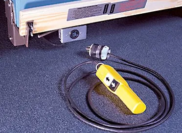 traditional pendant control for motorized bleachers with IN and OUT buttons